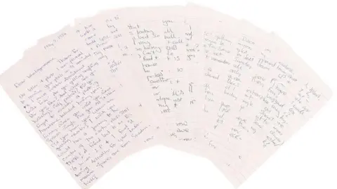 PA Media 11 or so letters spread out in a fan shape, on white lined paper with blue and black ink and against a plain white background