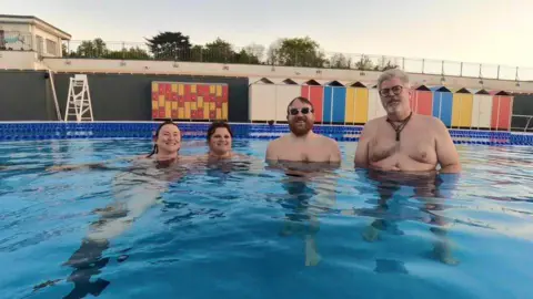 Rachel Jones Two women and two men in the water at Hilsea Lido