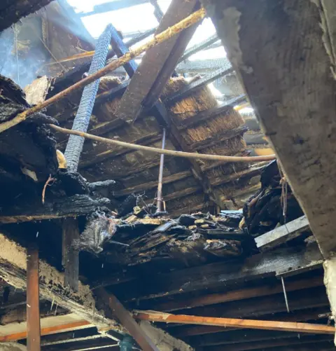 Derbyshire Fire and Rescue Service A fire-damaged roof