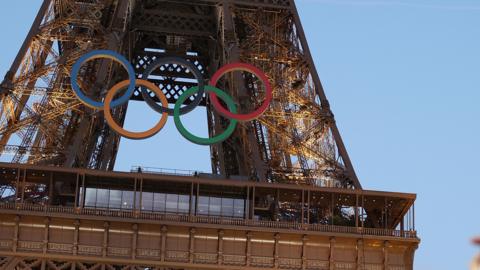 Olympic rings on the Eiffel Tower.