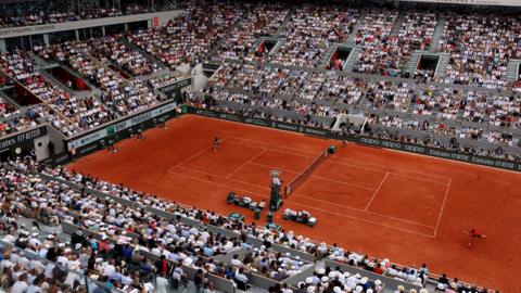 Fans watch the 2024 French Open in Court Philippe Chatrier