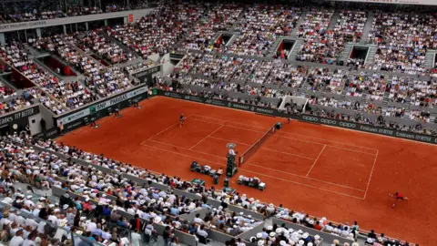 Fans watch the 2024 French Open in Court Philippe Chatrier