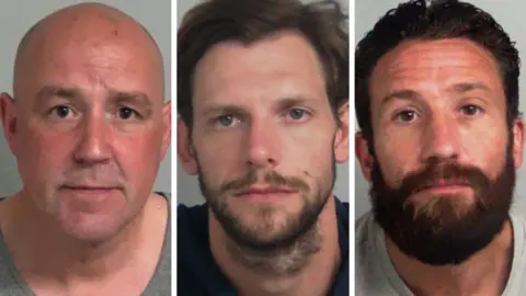 Essex Police A composite image of Dean Smith, Martin Peagram and Stuart Williams. They are pictures taken of them while in police custody. Smith has a shaved head; Peagram has brown hair and a short beard; Williams has dark slicked back hair and a bushier beard. None are showing any emotion.