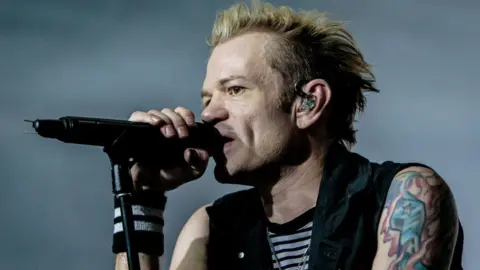 Corbis via Getty Image Deryck Whibley of Sum 41 performs at Carroponte, Spazio Mil on May 31, 2023 in Milan, Italy. 