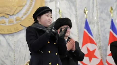 KCNA Kim Ju Ae, daughter of North Korean leader Kim Jong Un, attends a military parade to mark the 75th founding anniversary of North Korea's army, at Kim Il Sung Square in Pyongyang, North Korea February 8, 2023, in this photo released by North Korea's Korean Central News Agency (KCNA).
