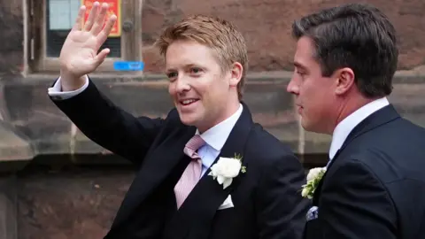 PA Media Hugh Grosvenor, the Duke of Westminster (left) arrives at Chester Cathedral for his wedding