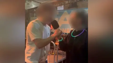 Lux Nightclub Image of interview with both paricipants' faces blurred