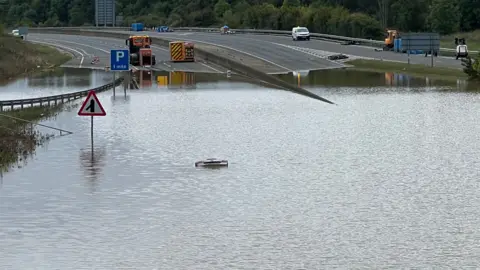 Steve Hubbard/BBC A421 Marston Moretaine is severely flooded