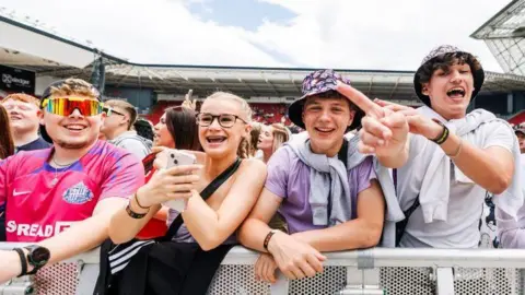 ASHTON GATE STADIUM/BS3 Teenagers at the front of a crowd at BS3 Live event