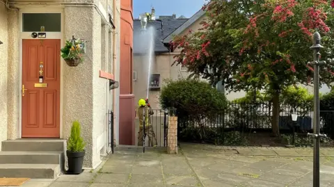 Firefighters extinguishing a fire in Edinburgh.