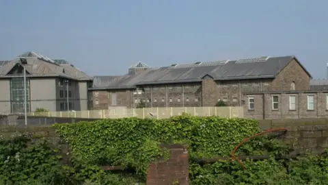 Richard Sutcliffe - Geograph A modern-day exterior photo of Cardiff prison. Within the bleak grey stone walls and sturdy gates still lie the remains of dozens of executed inmates