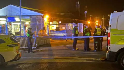 Pembrokeshire Herald Police gathering at Tenby station on Tuesday night