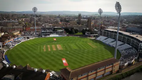 Getty Images An aerial view of the County Ground in Taunton during a Somerset cricket match. The main town and a line of hills are visible in the distance
