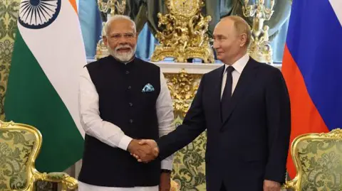 Getty Images Russian President Vladimir Putin (R) greets Indian Prime Minister Narendra Modi (L) during their bilateral meeting at the Grand Kremlin Palace, on July 9, 2024 in Moscow