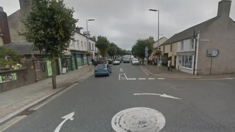 A Google Maps screenshot of the junction between Crown Street and Sullart Street in Cockermouth.