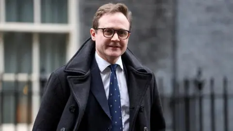 Reuters British Minister of State for Security Tom Tugendhat leaves Number 10 Downing Street after a Cabinet meeting in London, Britain, December 5, 2023.