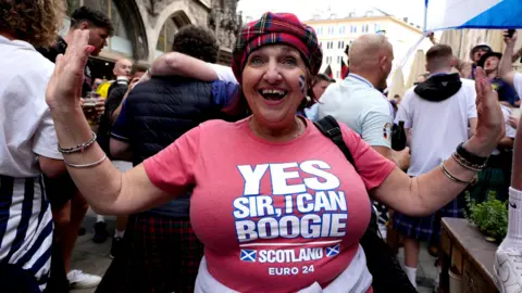 PA Female Scotland fan in Munich Old Town