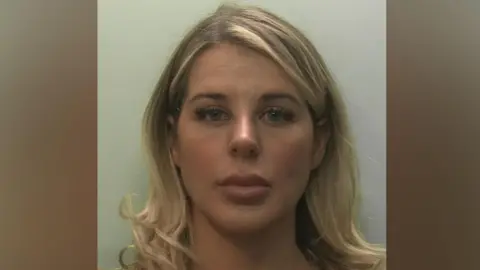 Devon and Cornwall Police Police mugshot of Paris Wilson, who has shoulder length blonde hair.