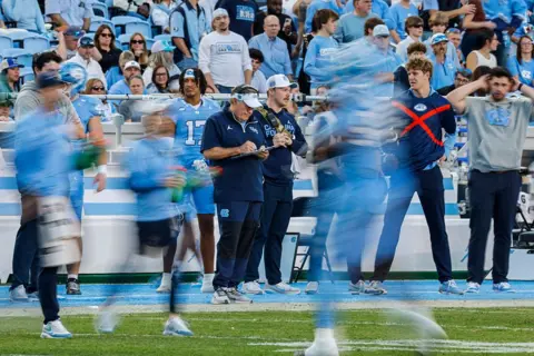 Getty Images Bill Belichick stands on the sidelines during a game against the Duke Blue Devils in November