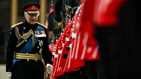 PA News King Charles with the Irish Guards