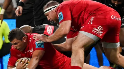 Alec Hepburn recovers possession for Scarlets