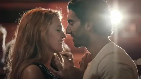 Sony Pictures/Everett/Shutterstock Blake Lively and Justin Baldoni face each other in the slow dance scene from It End's With Us