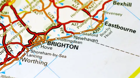 A map of the Sussex coastline showing Brighton in the centre with Hove, Shoreham-by-Sea, Lancing and Worthing to the west and Newhaven, Eastbourne and Bexhill to the east.