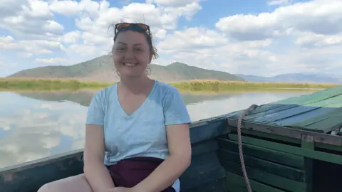 Kerry Blake Kerry Blake sat on a boat