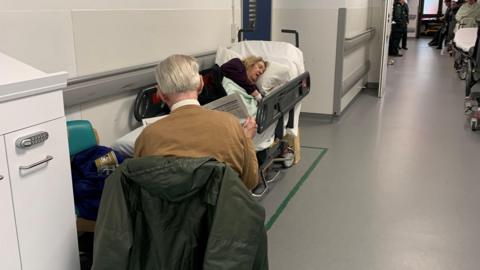 Nan Roberts, 88, on a trolley in a corridor at Royal Cornwall Hospital