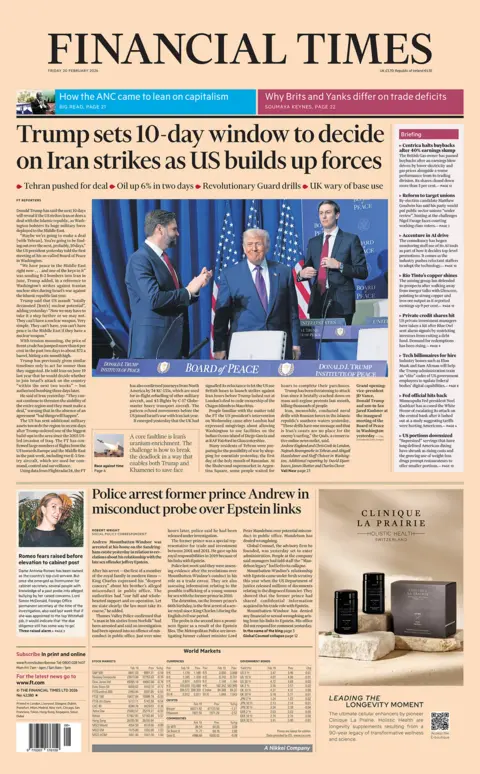 The front page of the Financial Times reads: 