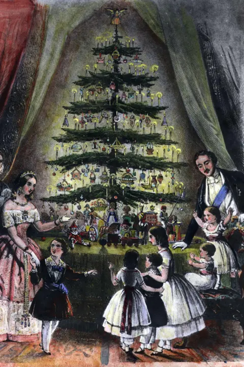 Hulton Archive via Getty Images December 1848: The Royal Christmas tree is admired by Queen Victoria, Prince Albert and their children.