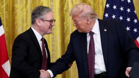 Reuters Keir Starmer shakes hands with Donald Trump