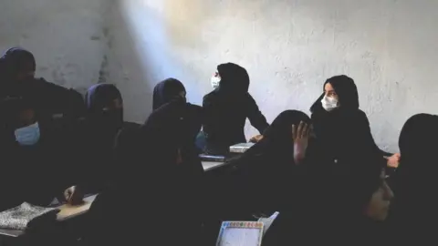 Reuters Afghan women in a religious school