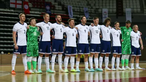 Ahmad Mora/The FA England Partially Sighted team singing the national anthem before a game