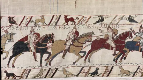Reuters Part of the Bayeux Tapestry showing hoorseman with spears 