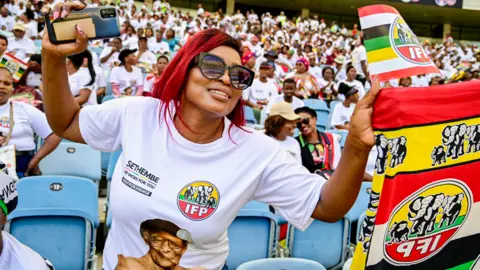 Getty Images Inkatha Freedom Party (IFP) supporters at a stadium in Durban, South Africa - March 2024