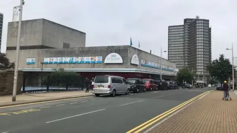 LDRS A grey concrete shopping centre