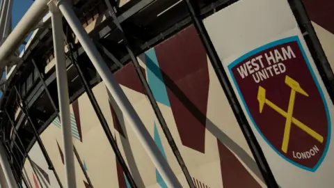 West Ham United badge on the outside of the London Stadium