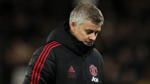Manchester United boss Ole Gunnar Solskjaer looks dejected after defeat by Wolves