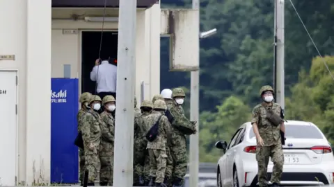 KYODO Soldiers seen around the shooting range after a teenage member of Japan's army was arrested on suspicion of attempted murder after a shooting incident in Gifu