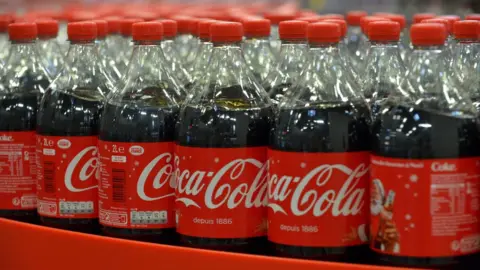 Getty Images Plastic bottles of Coca-Cola