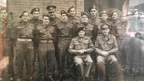 Andrew Charles Andrew Charles in a group photo with Field Marshal Montgomery