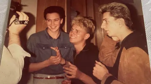 Depeche Mode turn photographers for Belfast fan