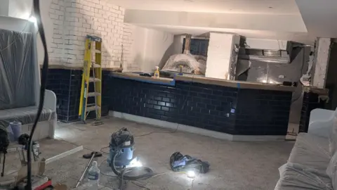 Adam Noble A wide shot of the restaurant interior. 