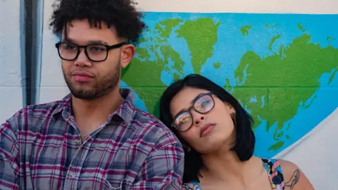 Coral Eyewear Two people wearing glasses from Coral Eyewear