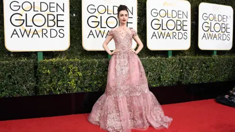 Getty Images Lily Collins at the Golden Globes 2021