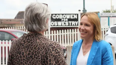 Helen Morgan Helen Morgan speaking to resident in Oswestry