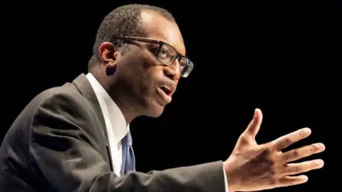 PA Media Kwasi Kwarteng delivers his keynote speech to party members at the annual Conservative Party conference in Birmingham