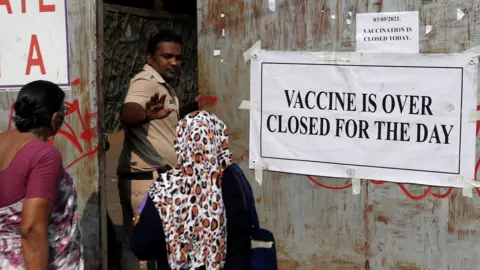 Reuters A vaccine centre is closed in Mumbai, India on 3 May