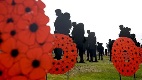 Silhouettes representing the 255 British soldiers and sailors who died